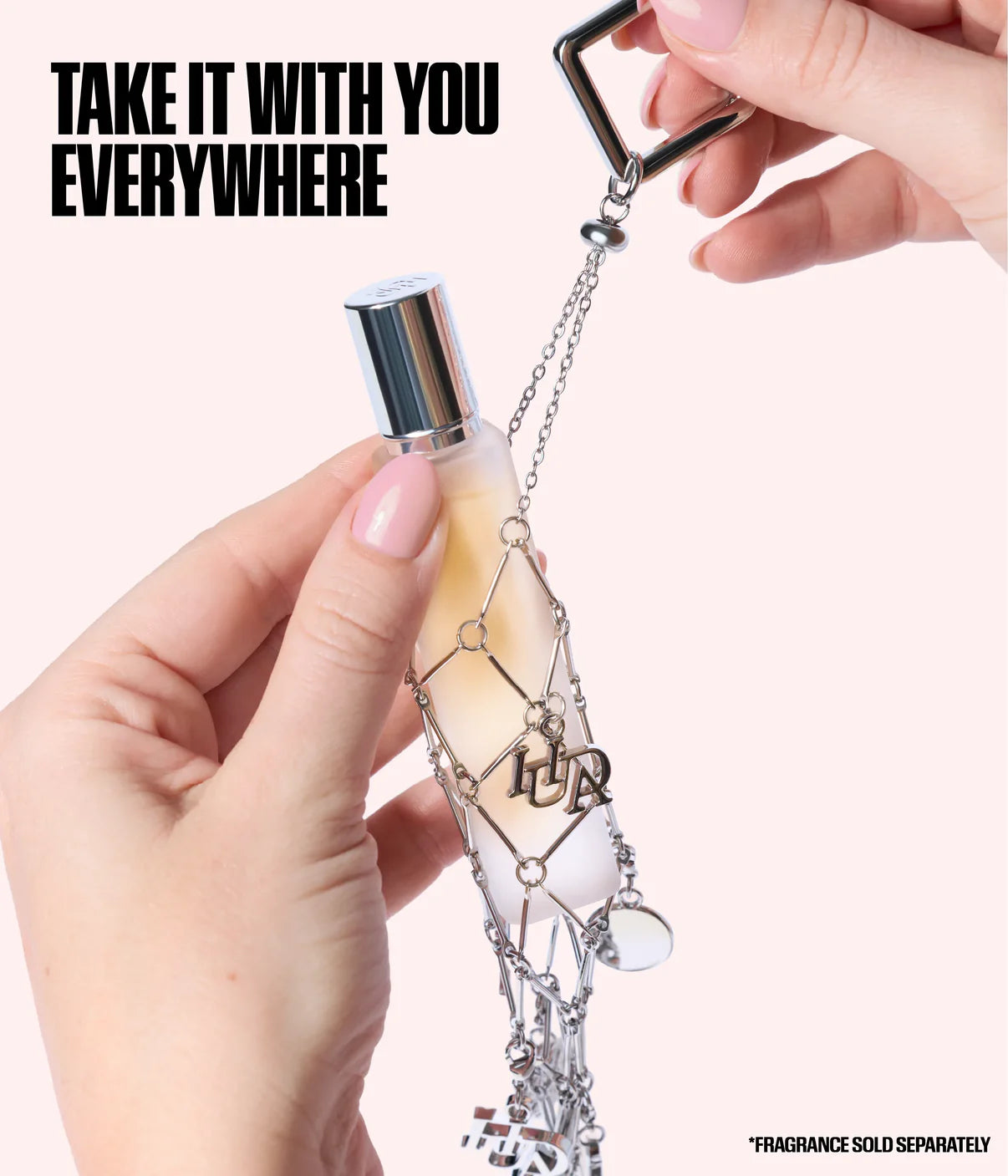 Huda Beauty Travel Spray Fragrance Holder - Lifestyle Shot 1 | Authentic in Egypt